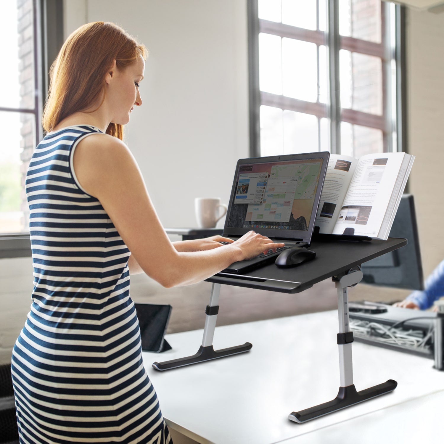 Aluratek Adjustable Laptop Stand Table lifestyle at work